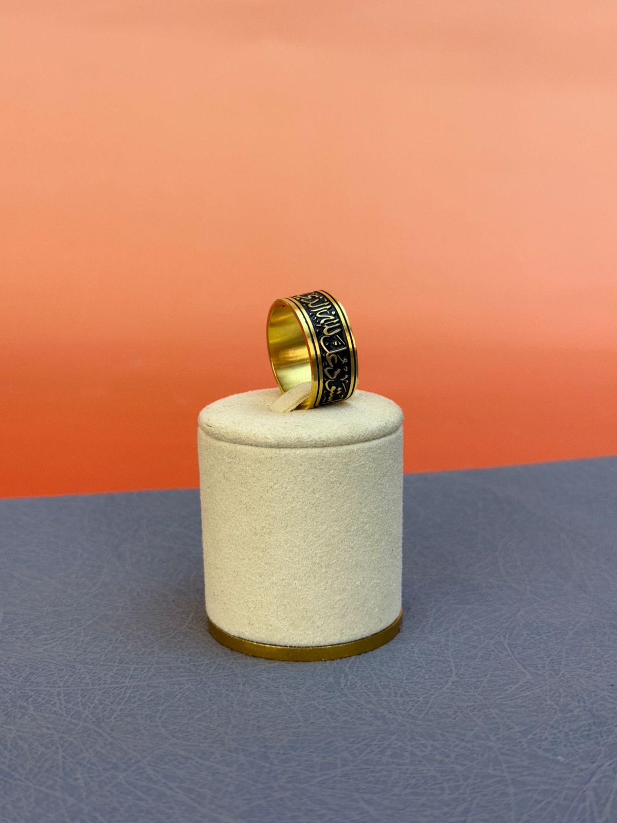 A ring with a religious phrase and laser engraving on the inside