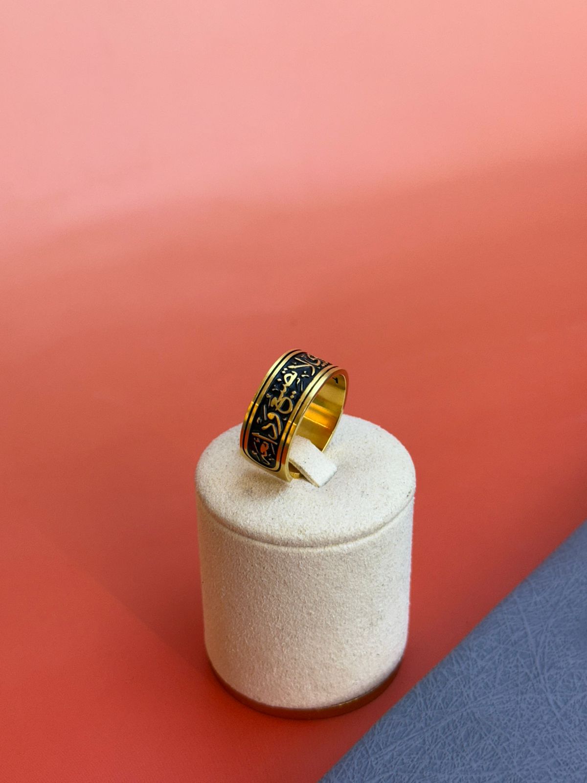 A ring with a religious phrase and laser engraving on the inside