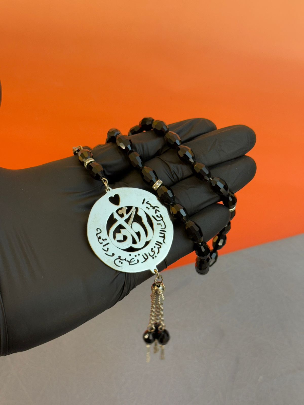 A Rosary with a religious phrase and laser engraving on the inside